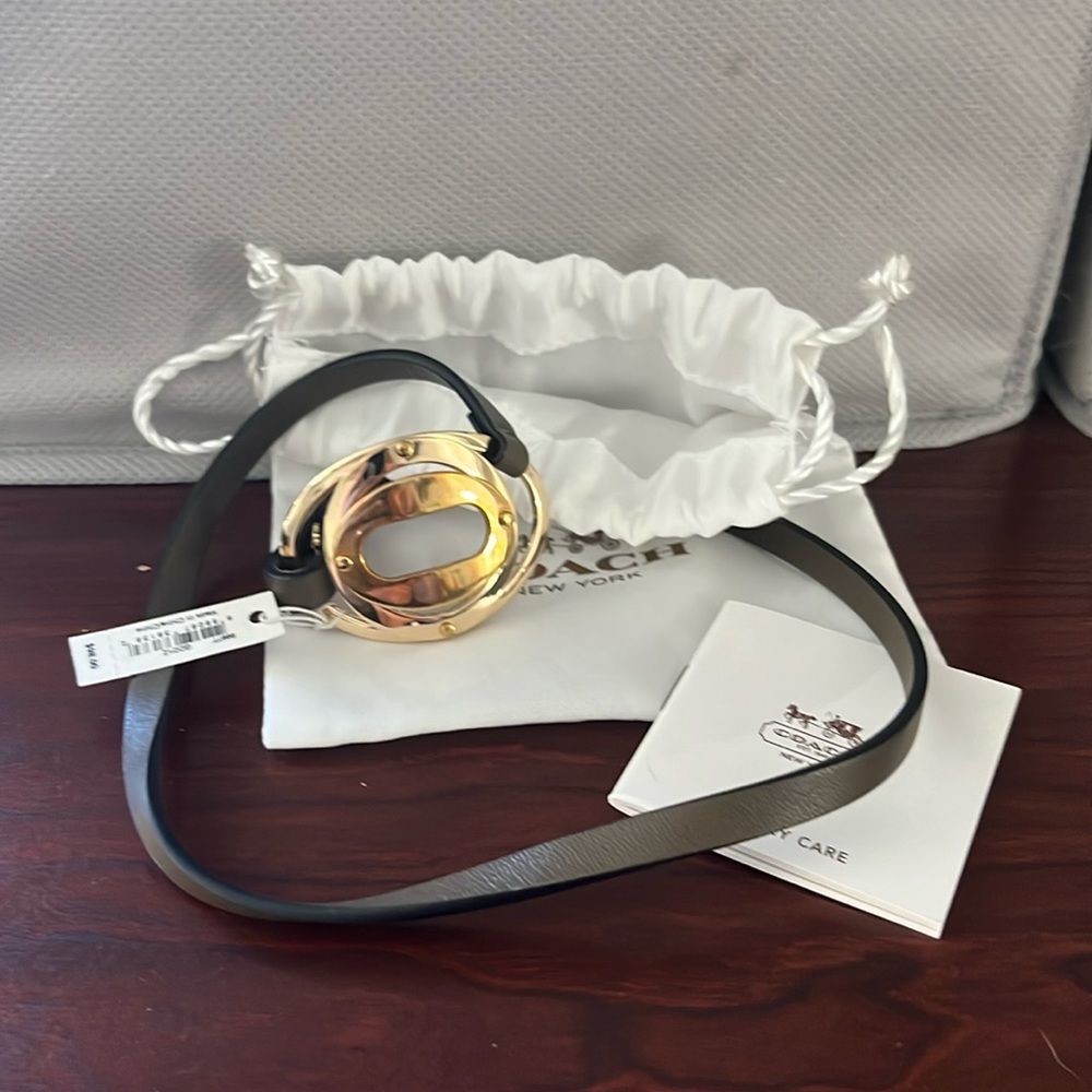 Brand new Coach army green wrap bracelet.